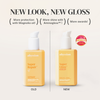 Zwei gelbe Flaschen des „Abyssian Supergloss Hair Serum“, die mit ihrer überarbeiteten Verpackung für verbesserten Schutz und mehr Glanz stehen.