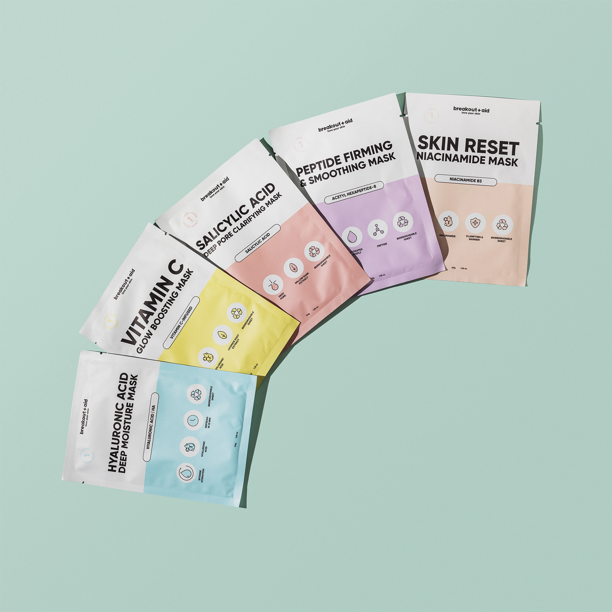 Vier Packungen mit Skin Mood Discovery Bundle-Gesichtsmasken in den Farben Blau, Gelb, Rosa und Weiß, fächerförmig angeordnet.