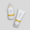 Philip Kingsley Body Building Shampoo und Conditioner vor einem hellgrauen Hintergrund.