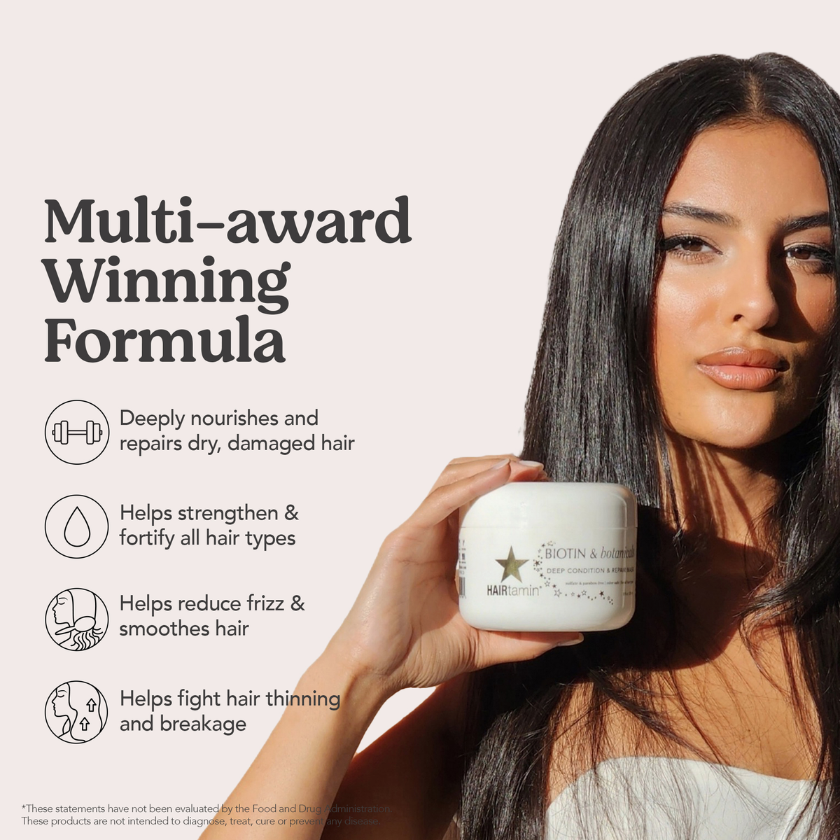 Frau hält einen Tiegel der Hairtamin Biotin & Botanicals Deep Condition & Repair Haarmaske vor hellem Hintergrund, glattes, glänzendes Haar.