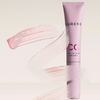Eine Tube Lumene CC All-In-One Primer mit rosa Grundierung, die auf einem hellen Hintergrund herumwirbelt.
