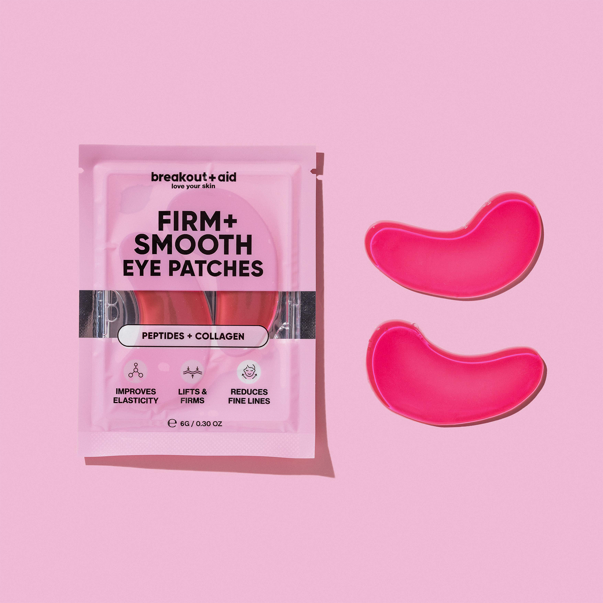 Eine Packung Firm + Smooth – Hydrogel-Augenpads neben zwei losen rosa Augenpads.