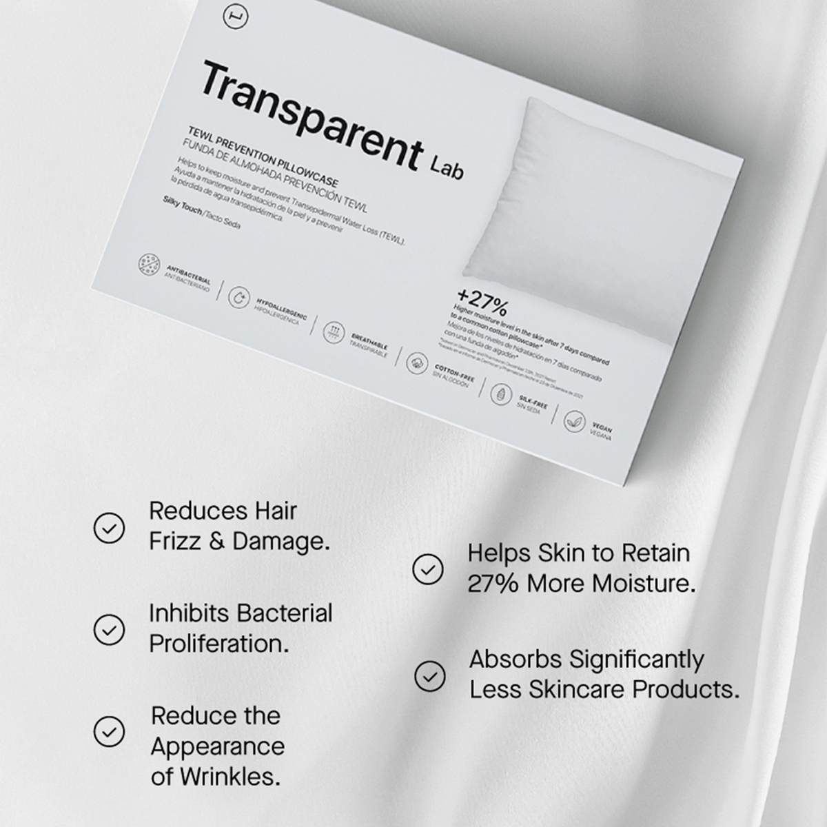 Eine weiße Kopfkissenbezug-Box von Transparent Lab listet Vorteile wie weniger Frizz und weniger Falten auf.