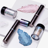 Danessa Myricks Beauty Colorfix Stix Infinity auf weißen Fliesen mit metallischen rosa, blauen und silbernen Mustern.