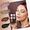Eine Frau mit geschlossenen Augen hält die Danessa Myricks Beauty Lightwork Palette Freedom Palette Everyday Magic in der Hand. Sie zeigt vier Farbfelder mit den Bezeichnungen Wish, Guiding Light, Rooted und Grounded.