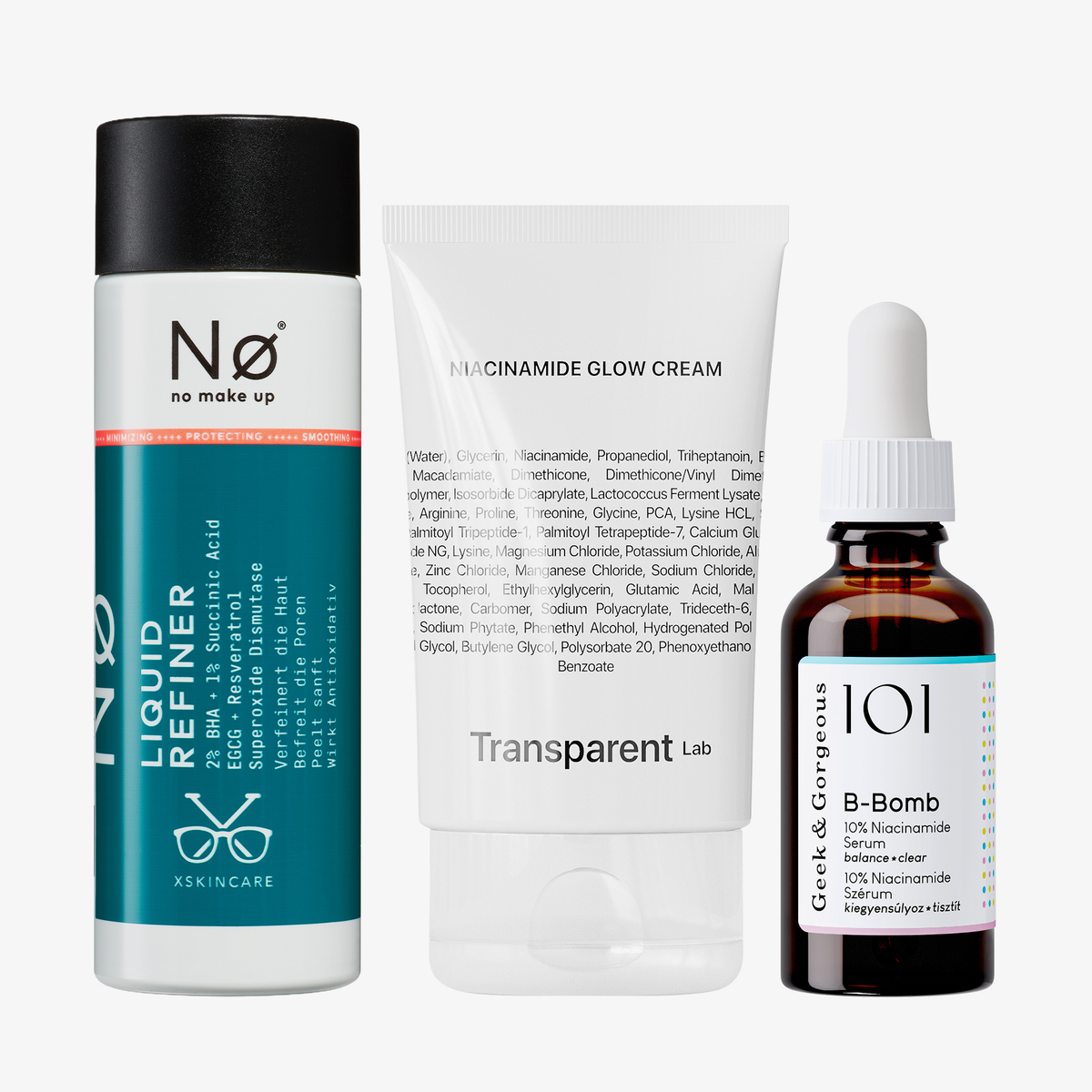 Das Fettige Haut Pflege-Set mit drei Skincare-Produkten vor hellem Hintergrund: Nø Cosmetics Exfoliating Liquid, Transparent Lab Niacinamide Glow Cream und Geek & Gorgeous B-Bomb.