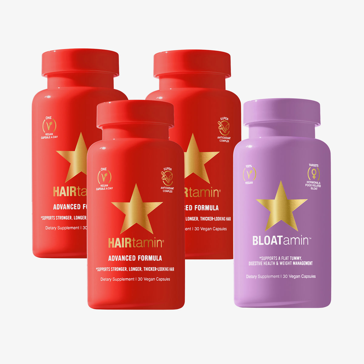 Das Advanced Debloat Bundle bestehend aus drei rote HAIRtamin Advanced Formula Flaschen und eine violette BLOATamin Flasche.