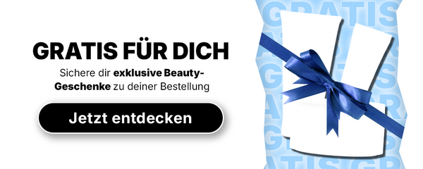 Weiße Geschenkbox mit blauer Schleife, einem deutschen Text, der kostenlose Beauty-Geschenke verspricht, und einem „Jetzt entdecken“-Button.
