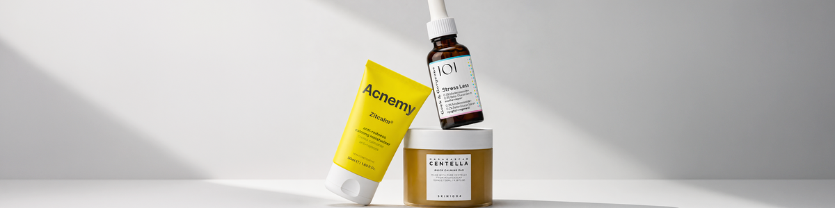 Drei Hautpflegeprodukte für dehydrierte Haut von Acnemy, Geek & Gorgeous und SKIN1004 auf hellem, minimalistischem Hintergrund.