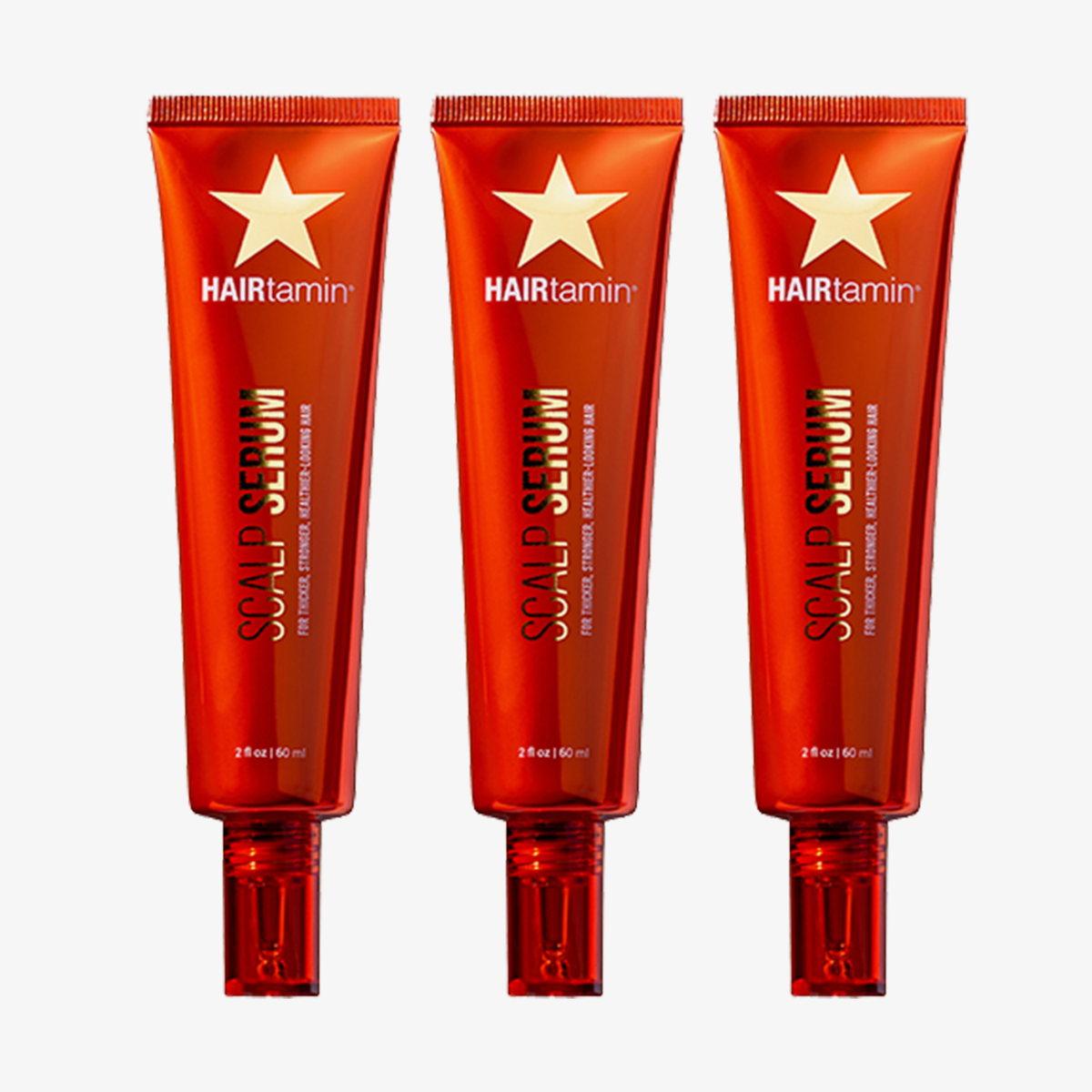 Dreier-Set HAIRtamin Scalp Serum: drei rote Tuben à 60 ml für die gezielte Pflege der Kopfhaut und kräftiger aussehendes Haar.