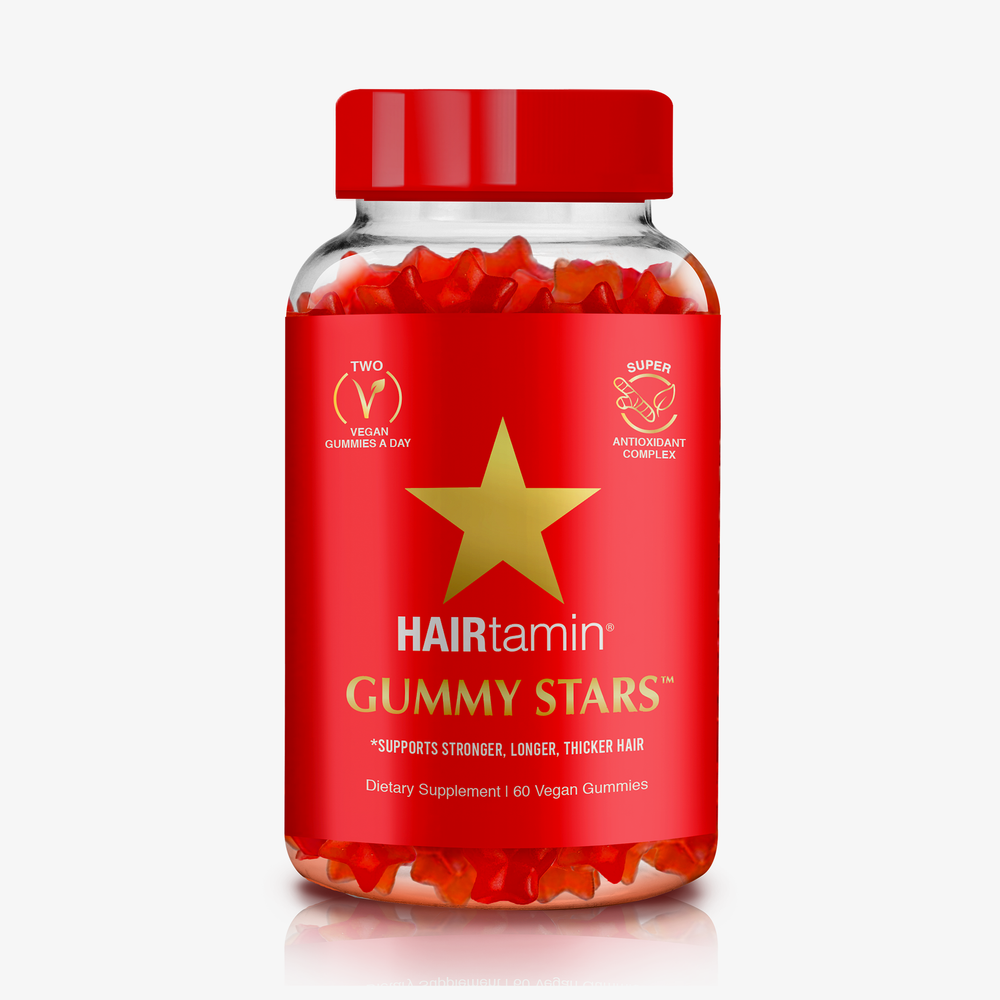 Eine Dose HAIRtamin Gummy Stars™ vor weißem Hintergrund.